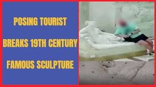 Posing tourist breaks 19th Century  Antonio Canova sculpture