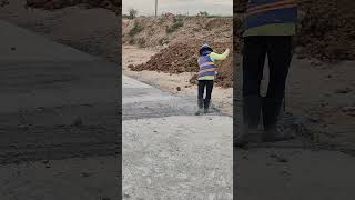 Workers clean concrete after break wall concrete