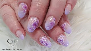 Salon nails. Gel rebalance with one stroke purple flowers.