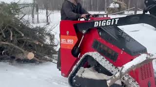 Diggit 850 china mini skid dragging entire 70 ft spruce branches on the top of the tree