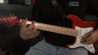 How to Play a G Minor Chord on a Left Handed Guitar