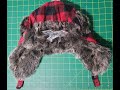 Embroidering a super thick fluffy Fur Trapper Hat. Using my Brother PR 600.