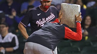 Nationals manager Davey Martinez uproots and boots first base after being ejected