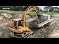 caterpillar e70b excavator loading dump trucks wee vlogs