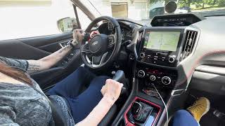 Tara demonstrates driving with the Veigel Classic II in Adaptive Mobility's Subaru.