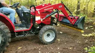 Clearing food plot with Mahindra 1526 and ratchet rake