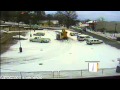 Snow Plow Falls in Sinkhole