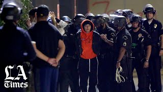 LAPD arrests dozens of people, declares gathering near Staples Center unlawful