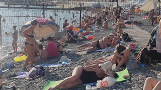 Sochi Hosta Osvod beach, a lot of people on the beach.Mlre is warm, the weather is excellent25.07.23