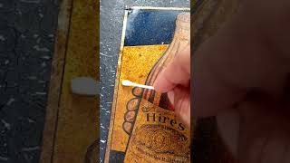 Cleaning a vintage sign