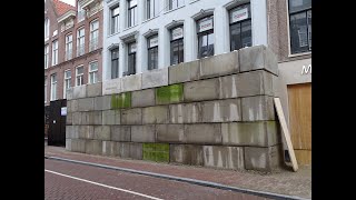 Winkels PC Hooftstraat e.o. dichtgetimmerd en gebarricadeerd met zeecontainers en betonblokken (2)