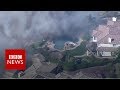 Wildfire: Aerial shots show devastation - BBC News