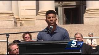 Student reads powerful poem at Teachers Rally