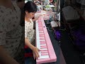 The pink piano matches you better~