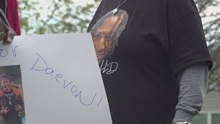Families and community members marched Saturday afternoon to honor men who lost their lives
