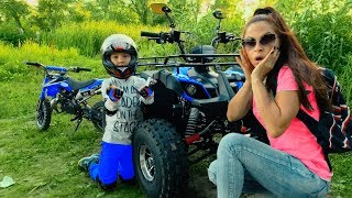 Den help Mom fix broken Quad bike