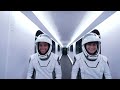 nasa space x crew 4 astronauts walk across the crew access arm at launch pad 39a