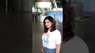 Zareen Khan nails the airport casual look with classic white top and blue denims #shorts