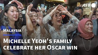 Mum and Malaysia celebrate Michelle Yeoh's Oscar win | AFP