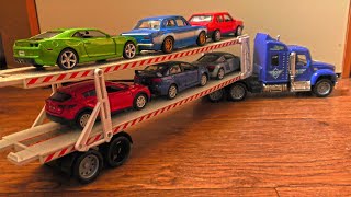 Video About Toy Cars Being Transported By Trucks (2 Car Transporters)