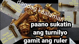 paraan ng pagsukat ng turnilyo gamit ang ruler.