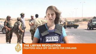 Battle for Gaddafi hometown continues