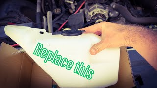 How to Replace Windshield Washer Reservoir 2003-2011 Ford Crown Victoria Mercury Grand Marquis