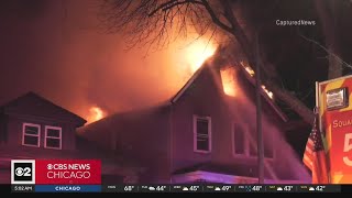 Fire spreads to two homes on Chicago's South Side
