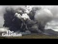 Erupting volcano spews ash two miles into Japan sky