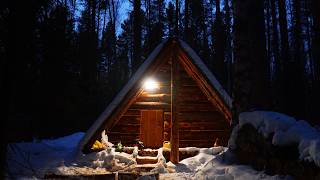 CABIN LIFE. A MAN BUILDS A SAUNA OUT OF LOGS. THE CABIN PROTECTS FROM STRONG WINDS!