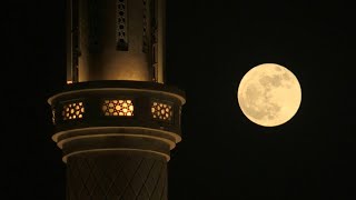 'Strawberry Supermoon' rises over Dubai | AFP