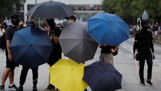 Radical protesters use umbrellas as weapons in HK protests