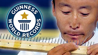 Most Needles Threaded With The Mouth - Guinness World Records