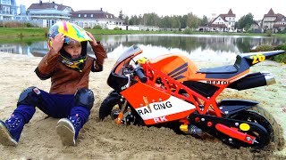 Senya on a motorcycle Stuck in the sand. Senya and his unusual life stories