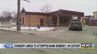 Standoff linked to attempted GR bank robbery; 1 in custody