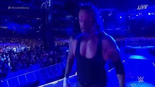 Undertaker retires at Wrestlemania, removes coat and hat