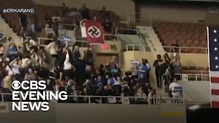 Protester interrupts Sanders rally with Nazi flag