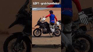 Use both hands and one foot to lift an ADV motorcycle onto its center stand #shorts