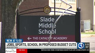 Parents react to proposed elimination of middle school athletics, closure of elementary school du...