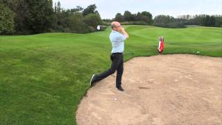 Bunker Shot - How to play from a downslope