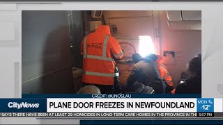 Passengers spend 15 hours on tarmac after plane door freezes