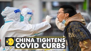 China tightens curbs amid a surge in COVID-19 cases driven by the Omicron mutant variant | WION