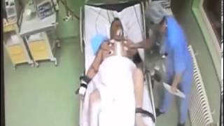 Doctor Punches Helpless Patient