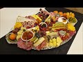 charcuterie board with fruit crackers meats and cheeses terrines cc sub savori urbane