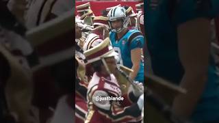 Carolina Panthers kicker Graham Gano warms up with Tampa Bay Buccaneers marching band NFL 2014