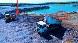 WOW Additional battery activity for the project! Use trucks and wheel loaders to dump boulders into…