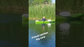 being dragged around in kayak by giant carp