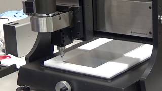 Hole cutting by a CNC milling machine