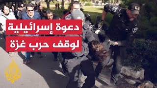 الشرطة الإسرائيلية تعتدي على متظاهرين في القدس طالبوا بوقف الحرب على غزة