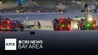 Delta plane flips during landing at Toronto airport